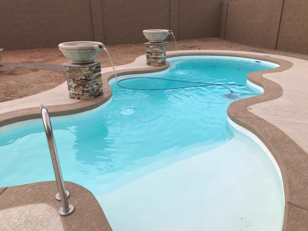 White fiberglass pool